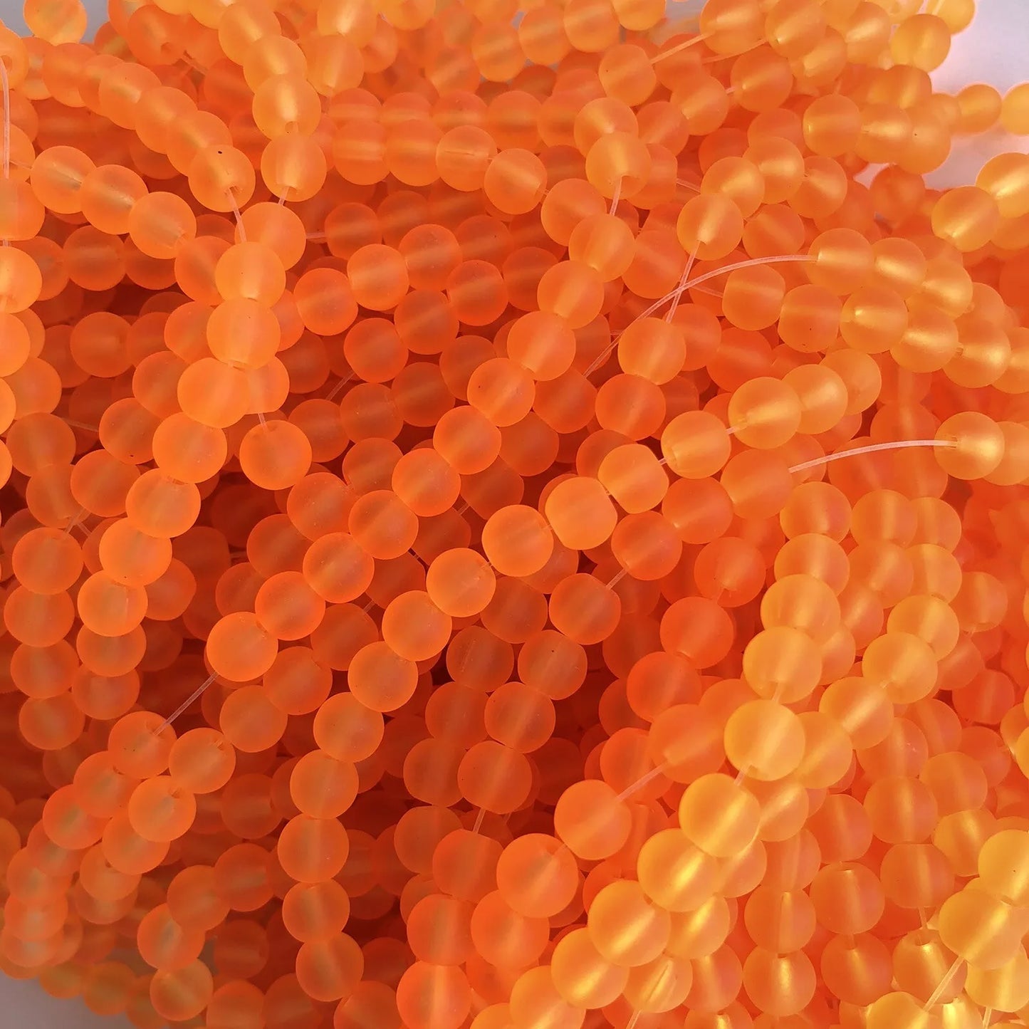 6mm Orange frosted glass beads - 135 pieces per strand - Loose jewellery making bead - Round transparent beads - 80cm strand