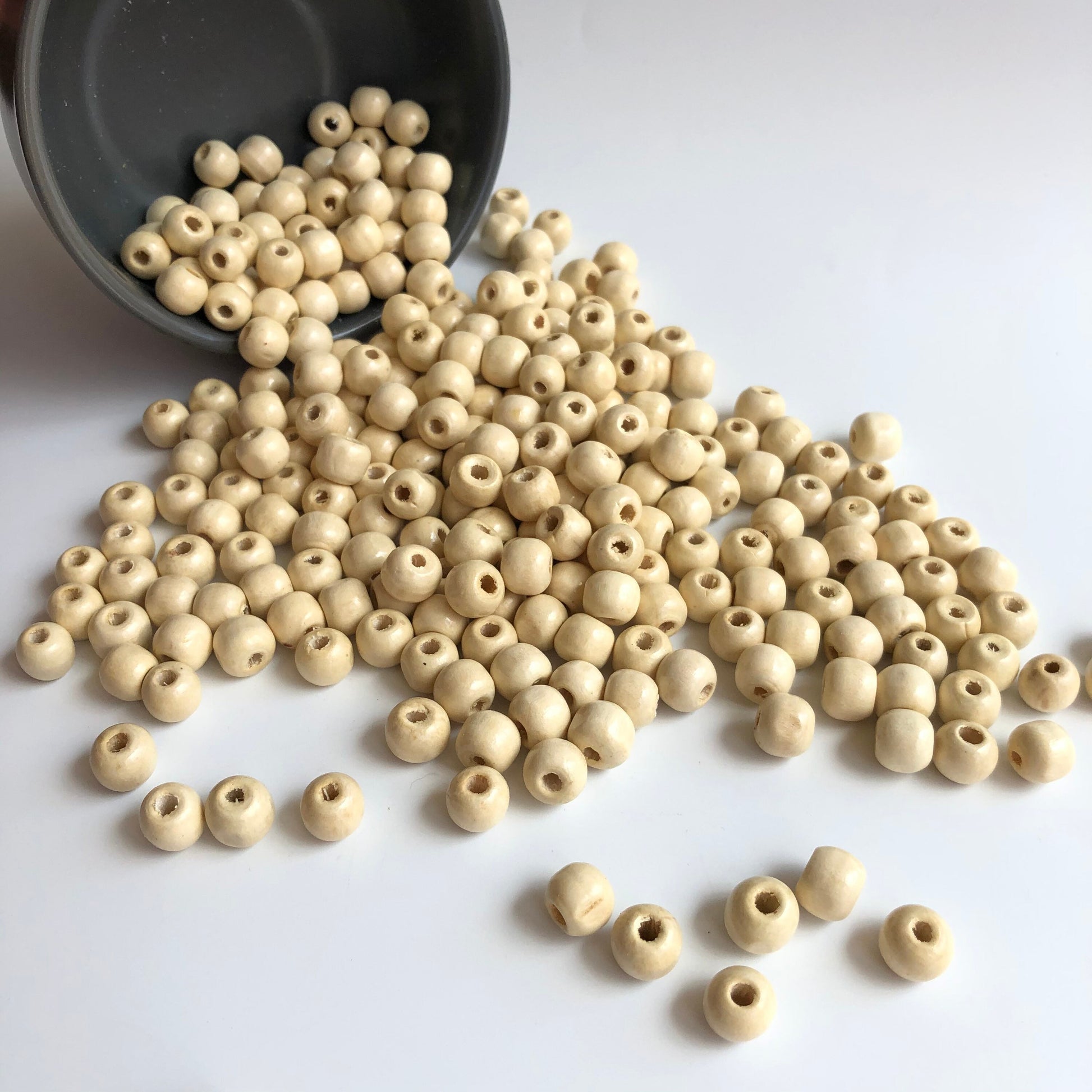 Round Beige Wood Beads dispersed