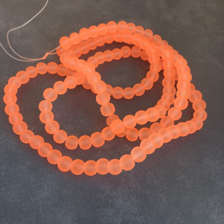 6mm Fluro orange frosted glass beads - 135 pieces per strand - Loose jewellery making bead - Round transparent beads - 80cm strand