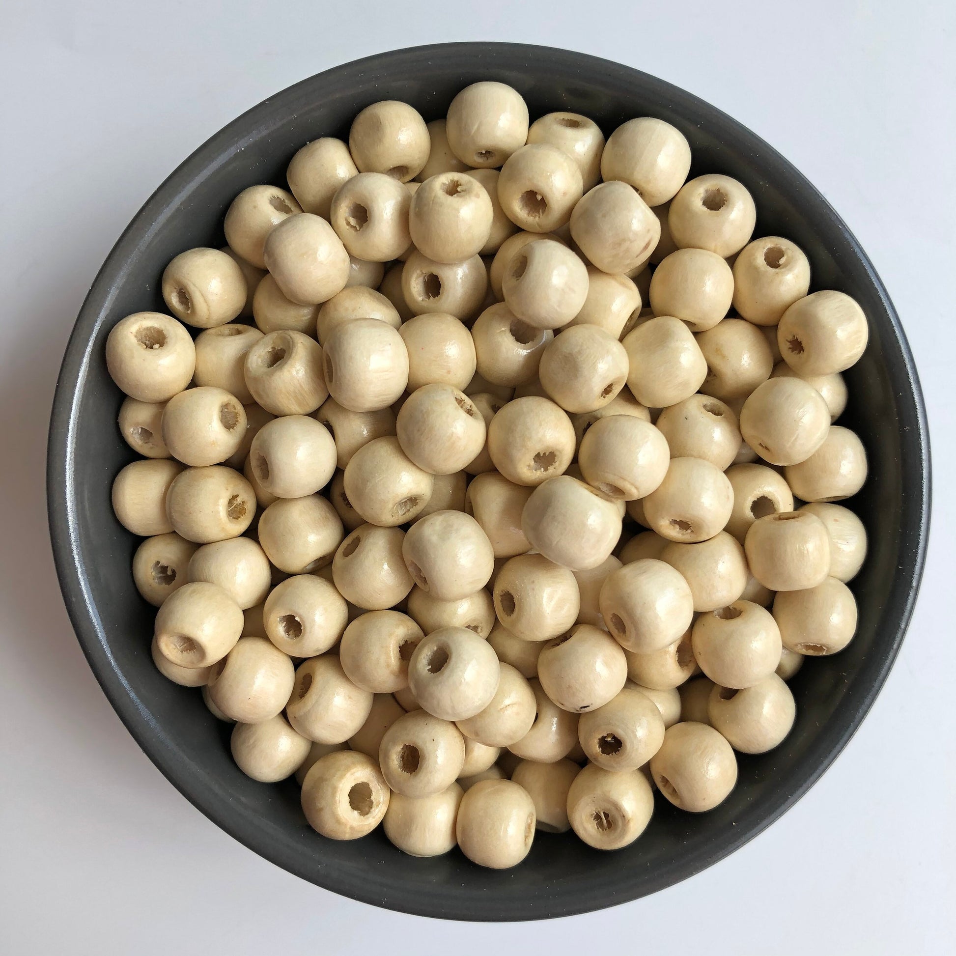 Round Beige Wood Beads in Bowl