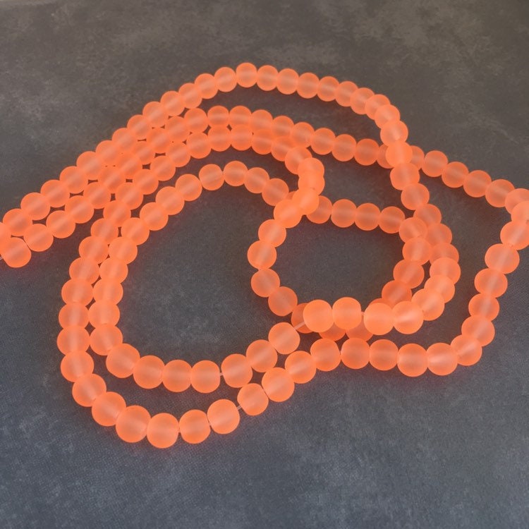 6mm Fluro orange frosted glass beads - 135 pieces per strand - Loose jewellery making bead - Round transparent beads - 80cm strand