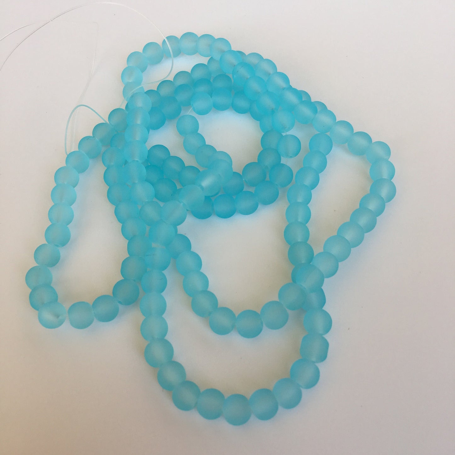 6mm Sky blue frosted glass beads - 135 pieces per strand - Loose jewellery making bead - Round transparent beads - 80cm strand