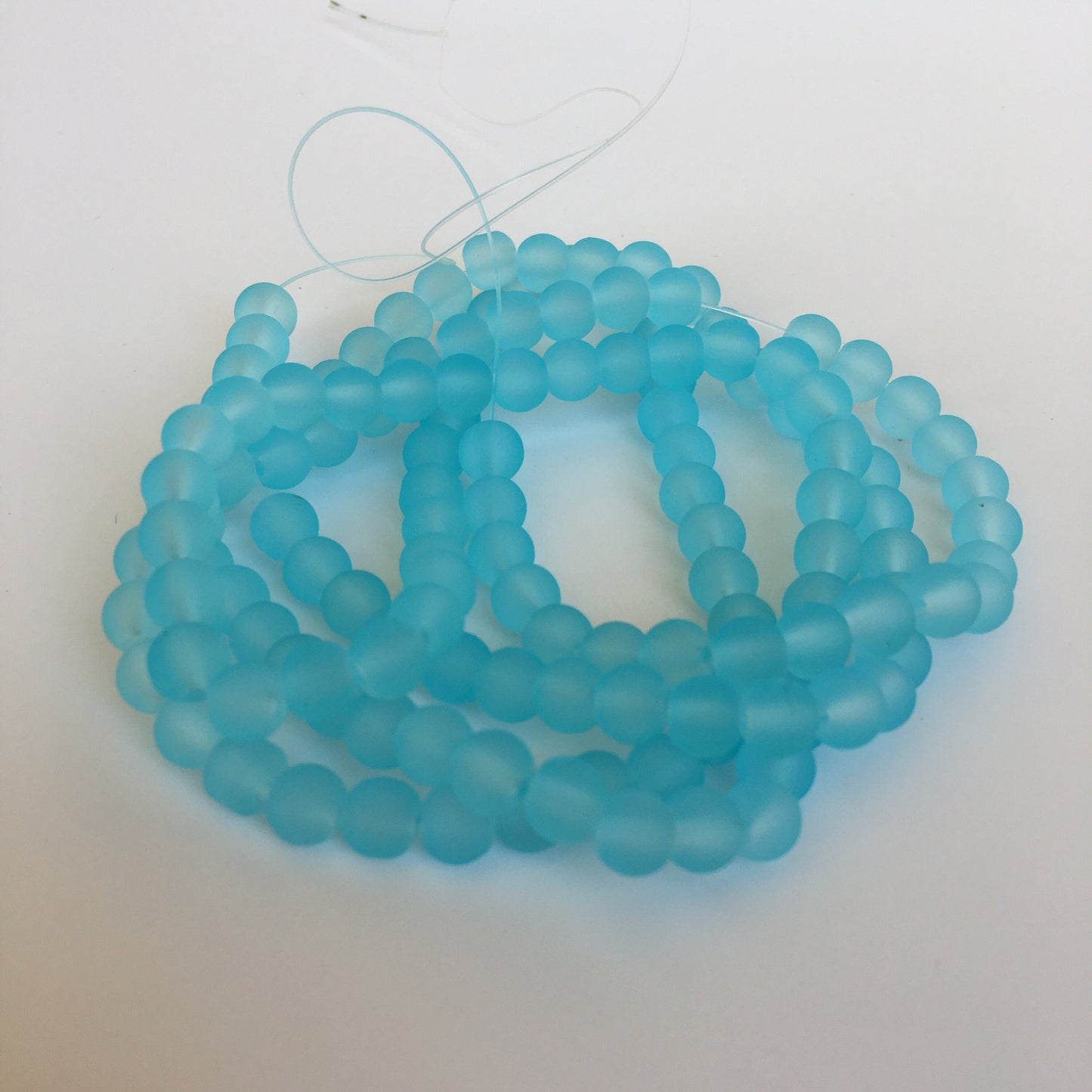 6mm Sky blue frosted glass beads - 135 pieces per strand - Loose jewellery making bead - Round transparent beads - 80cm strand